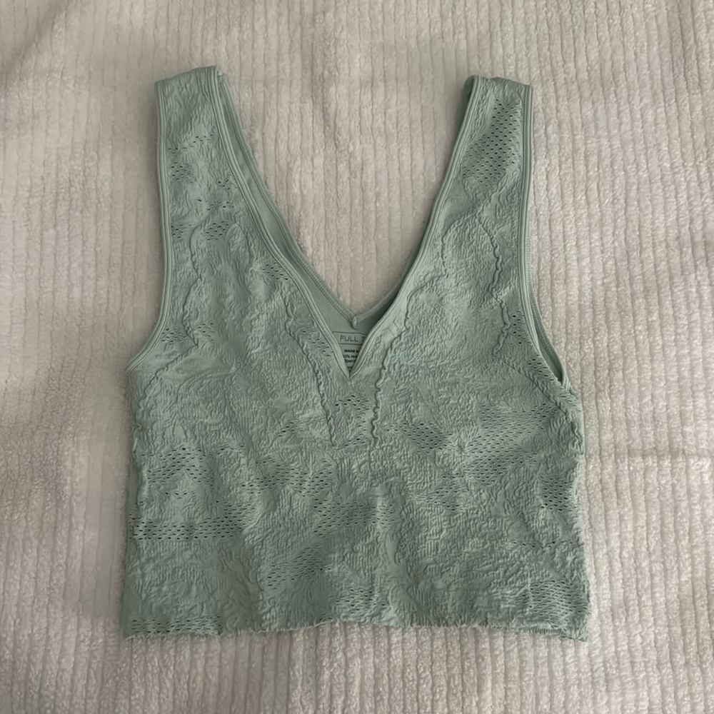 This is a size M/L teal tank top from Tilly’s.